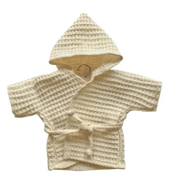 Ein Bademantel von Minikane. Entworfen und hergestellt für die Kollektion Baby